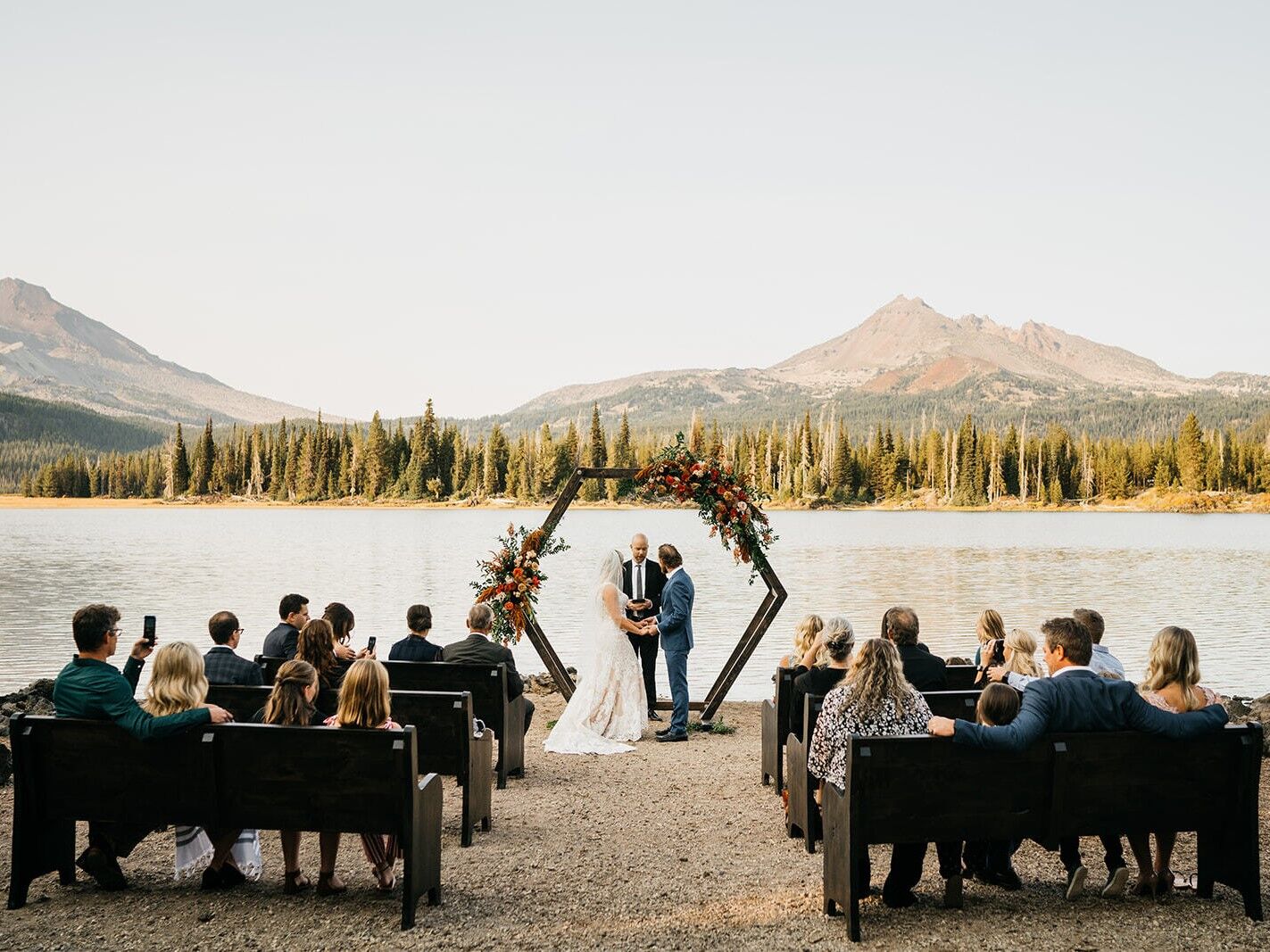 An intimate wedding ceremony on a beautiful lakeside. 