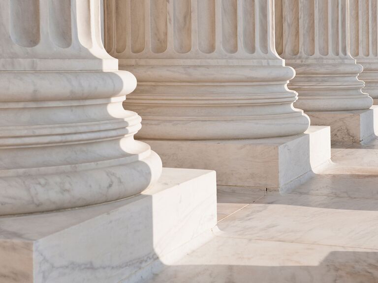 supreme court base of columns upholding justice