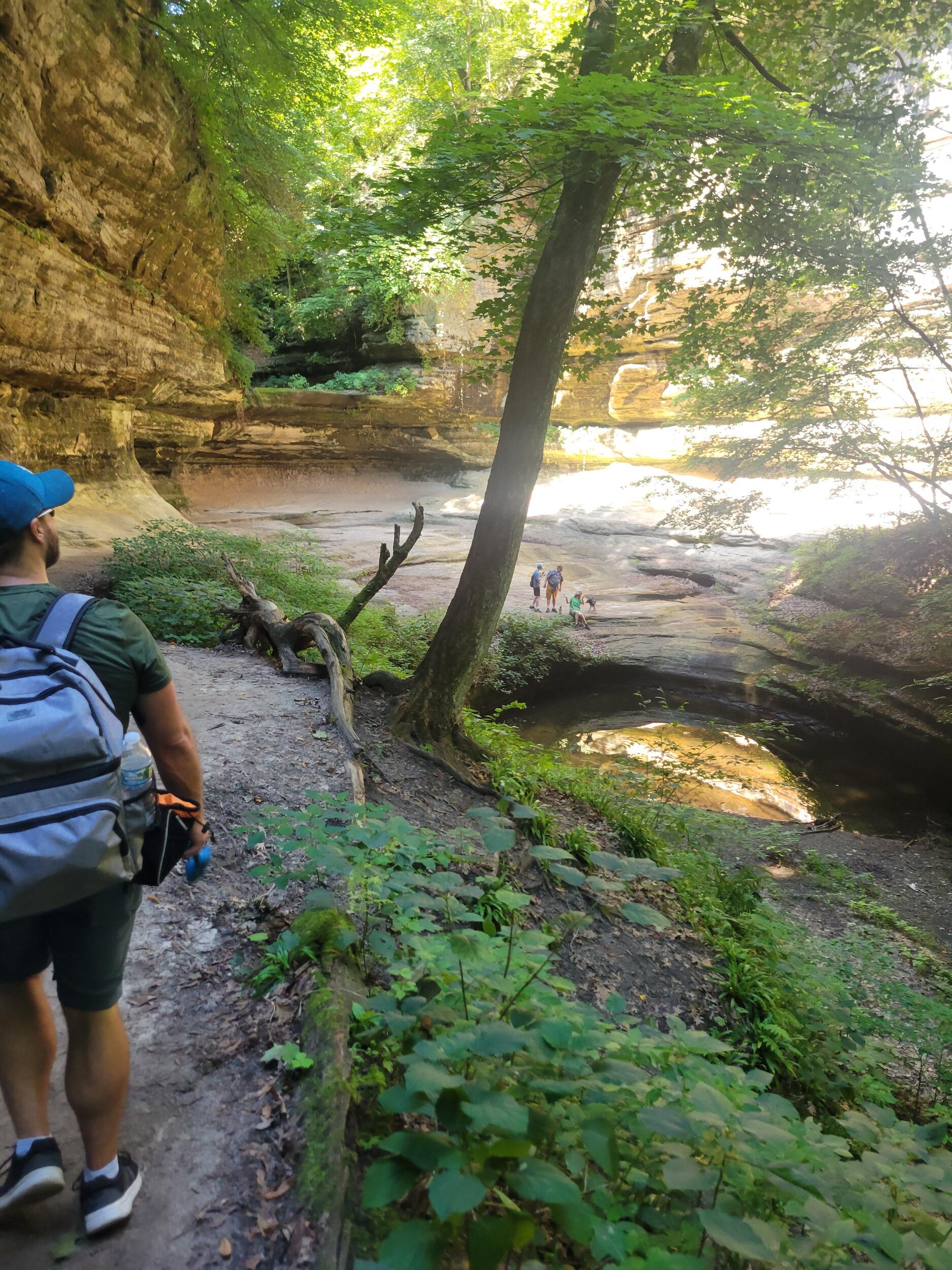 A picture of Katy's oblivion. You can see the ring box in the backpack as we were approaching the proposal spot.