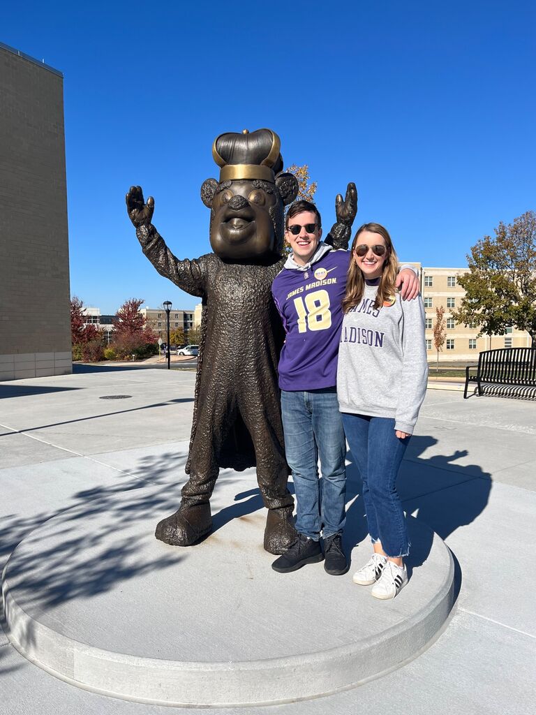Ansley's first time going to a football game at Zach's alma mater, James Madison University. Zach and Ansley now have season tickets and attend many tailgates and games together with friends.