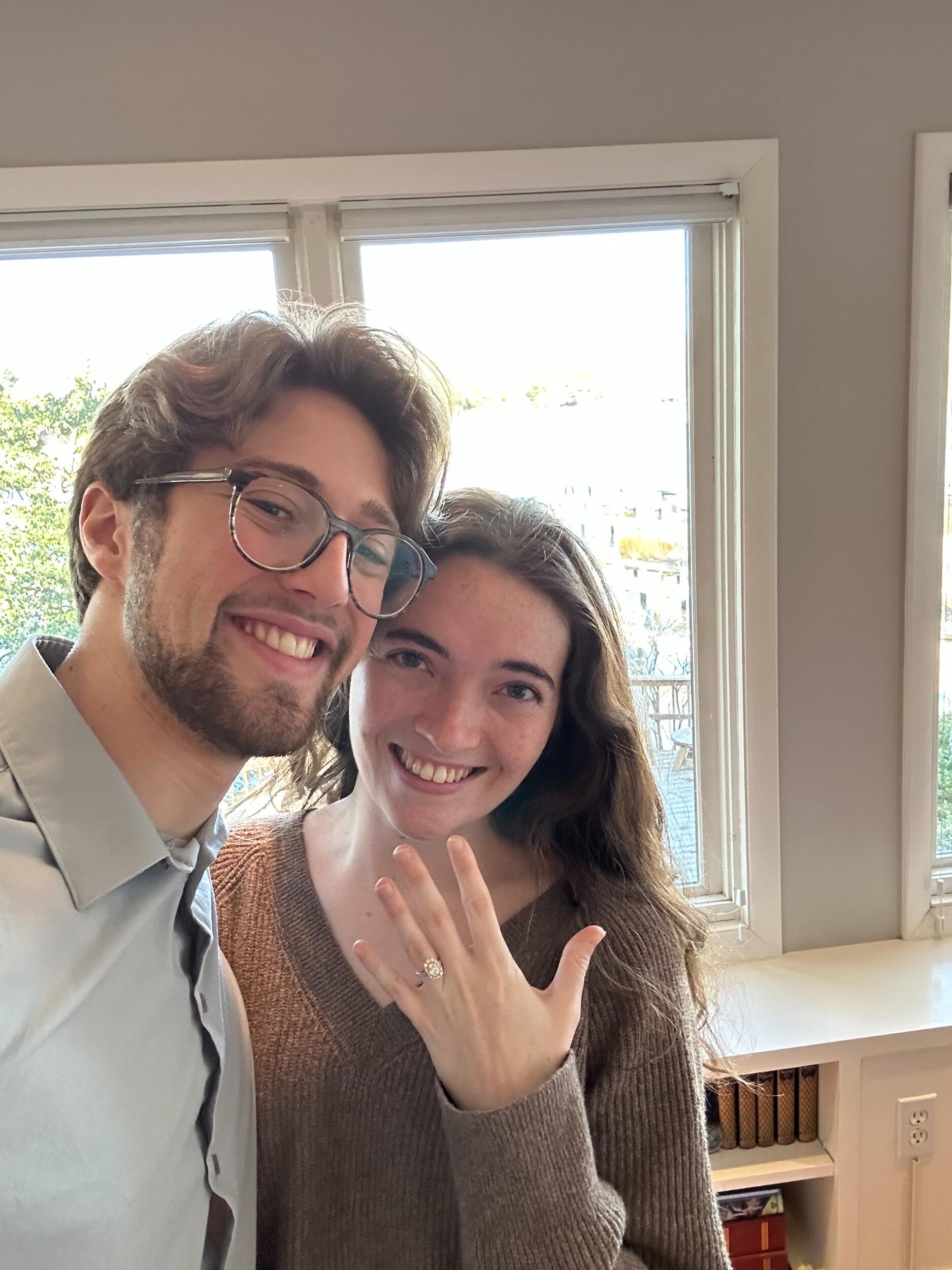 And finally, here's us at our engagement! We can't wait to see you at the wedding!