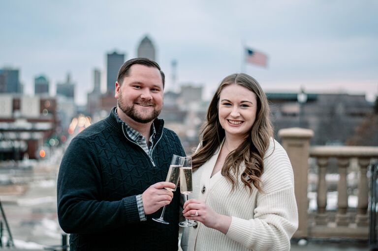 Joe had planned a two year anniversary dinner and surprised Amanda by proposing before with a photographer to capture the special moment! Amanda eagerly said yes and shortly after they began planning their wedding!