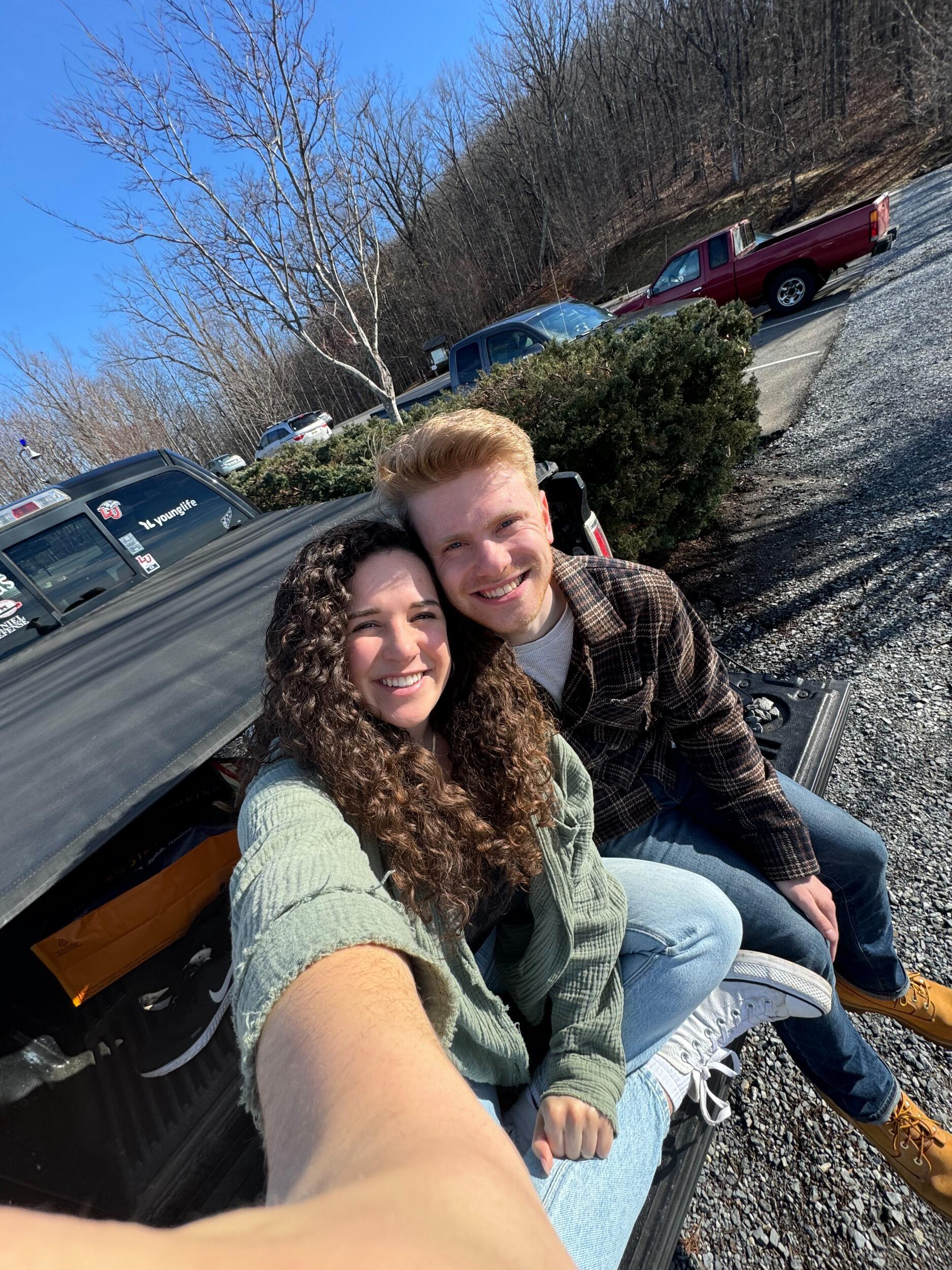 3 months after their first date, Michael realized he loved Em and HAD to tell her. The night that she got home from a trip with her family, he said it to her coincidentally outside his house in the exact spot that they first met. She said it back ;)