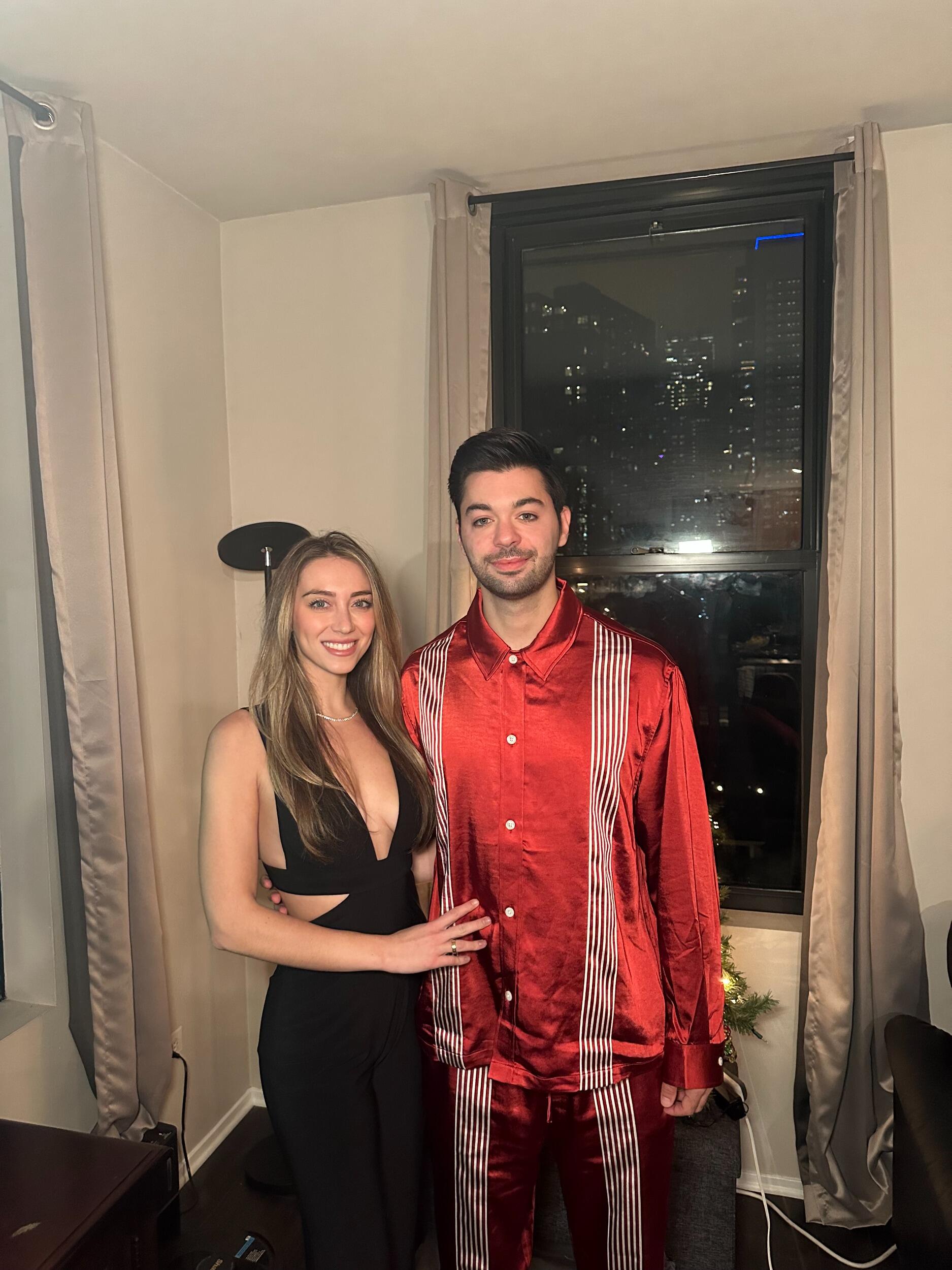 Lexi + Tyler ring in 2025 in Chicago. It is officially their wedding year!!!!