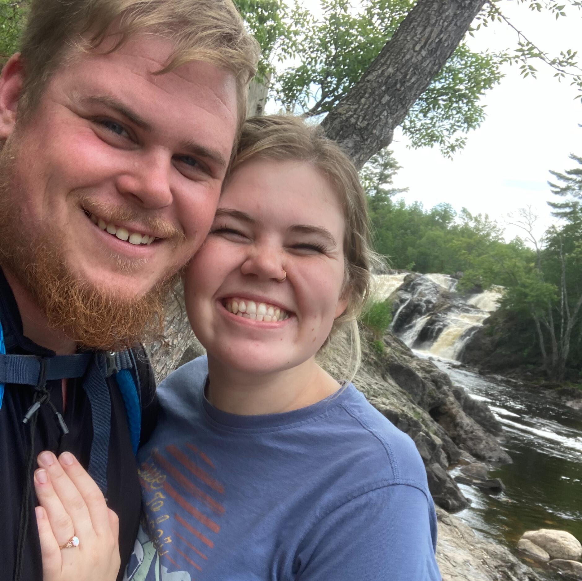While hiking near Kawishiwi Falls in Ely, MN Nathaniel asked Elizabeth to be his wife and she said YES!