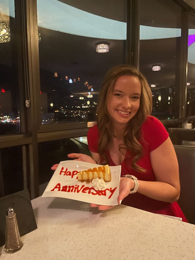 Matthew and Erica went to a Eighteen at the Radisson to celebrate their 1-year anniversary. Matthew secretly ordered a piece of cheesecake to surprise Erica. 
