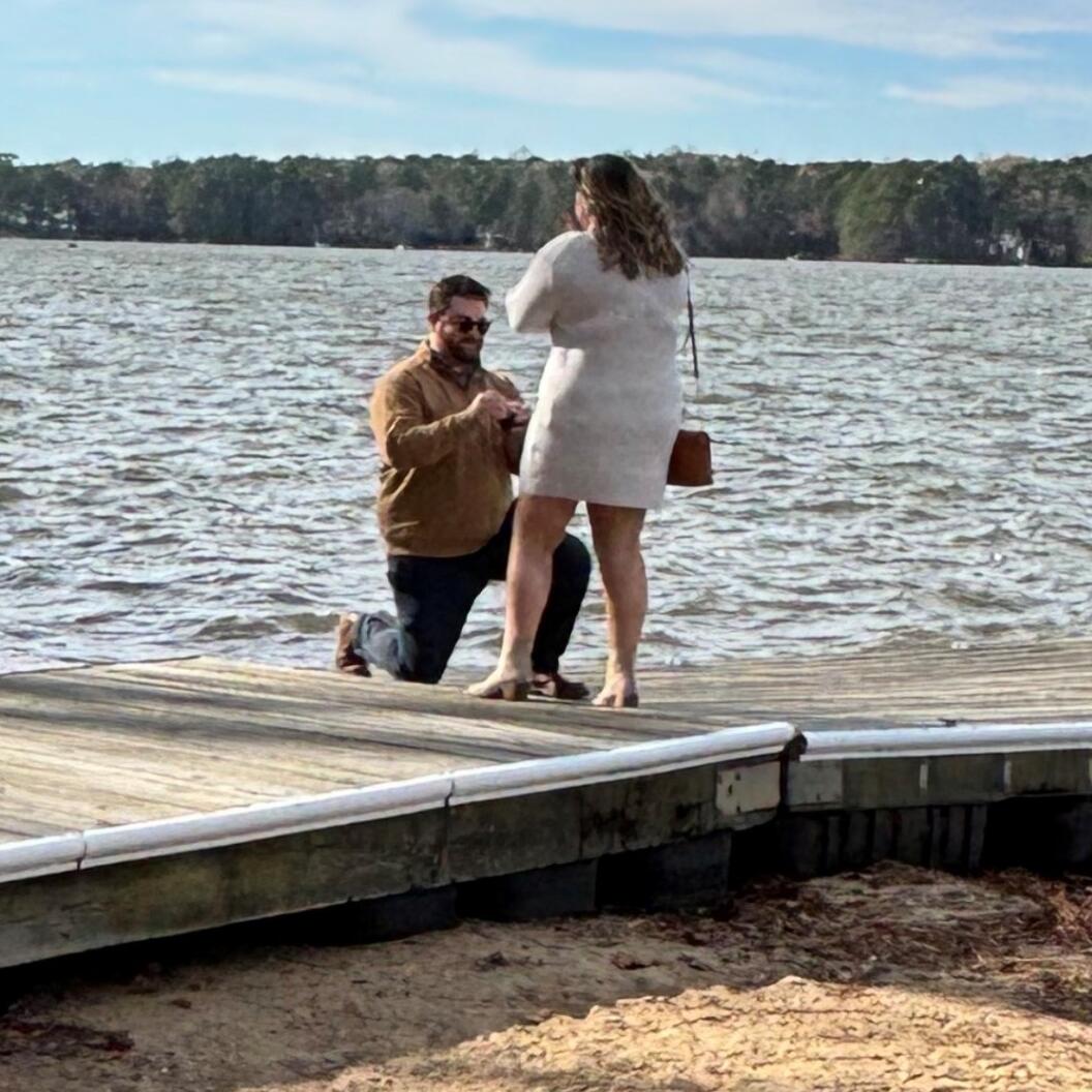 After months of sneaking off to Jared, texting Liza's friends and family when she wasn't looking, and a bee-infested conversation with Liza's dad, Ryan proposed to Liza in December 2024. With the help of a couple friends, doing their best ninja impressions hiding in the bushes, the couple was able to capture the best moment ever!