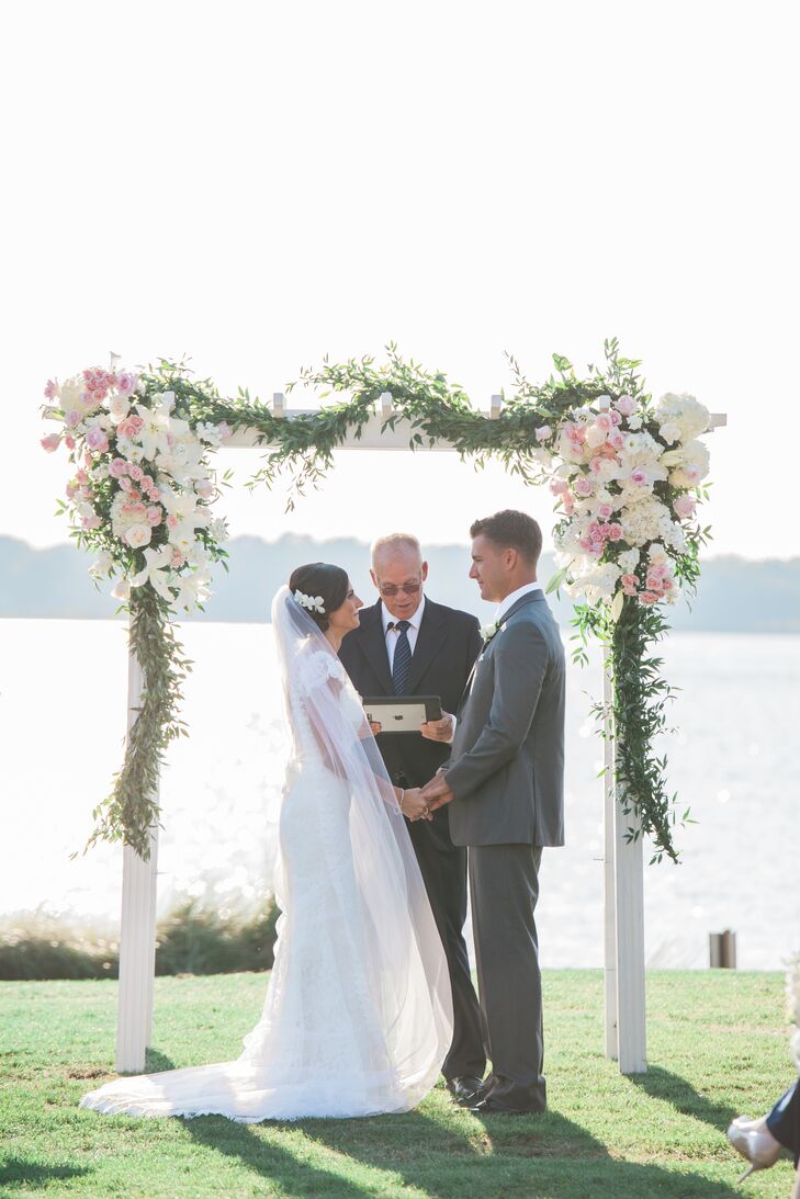 Blush And Ivory Flower Decorated Wooden Wedding Arch