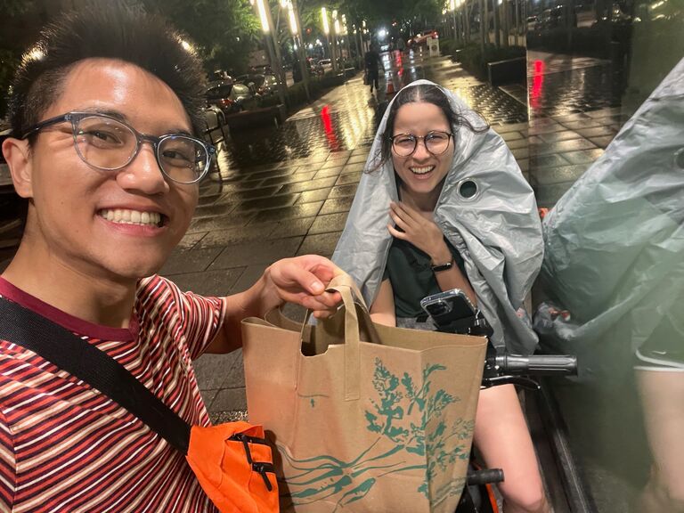 Kevin and Ingra couldn't be happier going to WholeFoods in the rain!