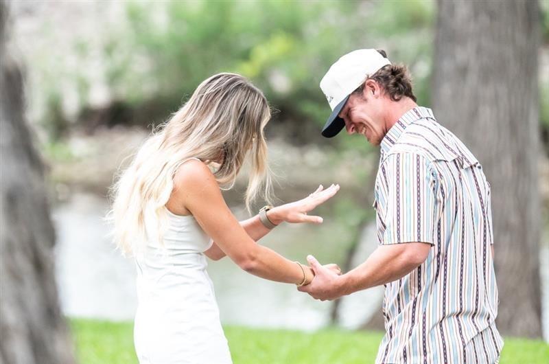 Garrett proposed and asked Cassidy to marry him at The Frio River -  a place where Cassidy has spent summers growing up and holds a very special place in her heart. Garrett was so thoughtful to choose such a meaningful spot for this unforgettable moment!