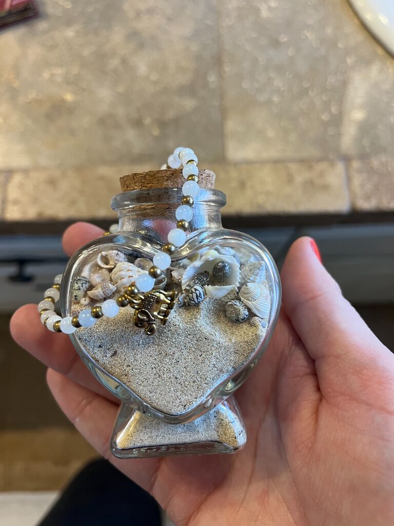 Chris left for Thailand. He collected seashells from the beaches of Thailand for me.