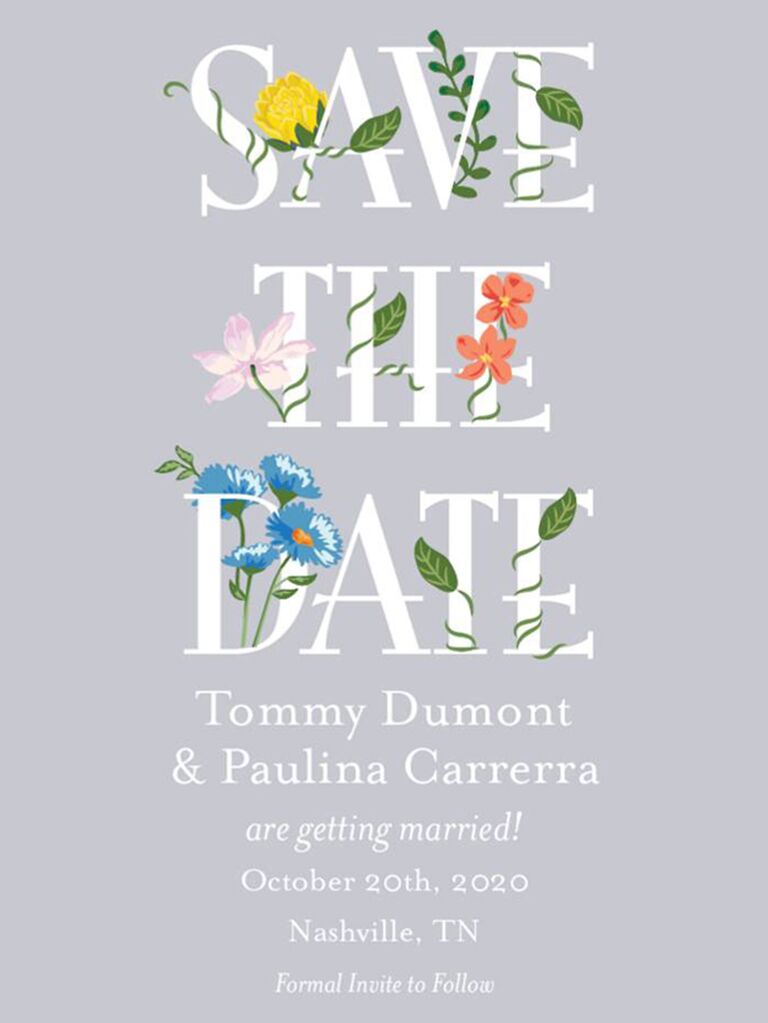 'Save the Date' adorned with colorful flowers above event details in white type on gray background