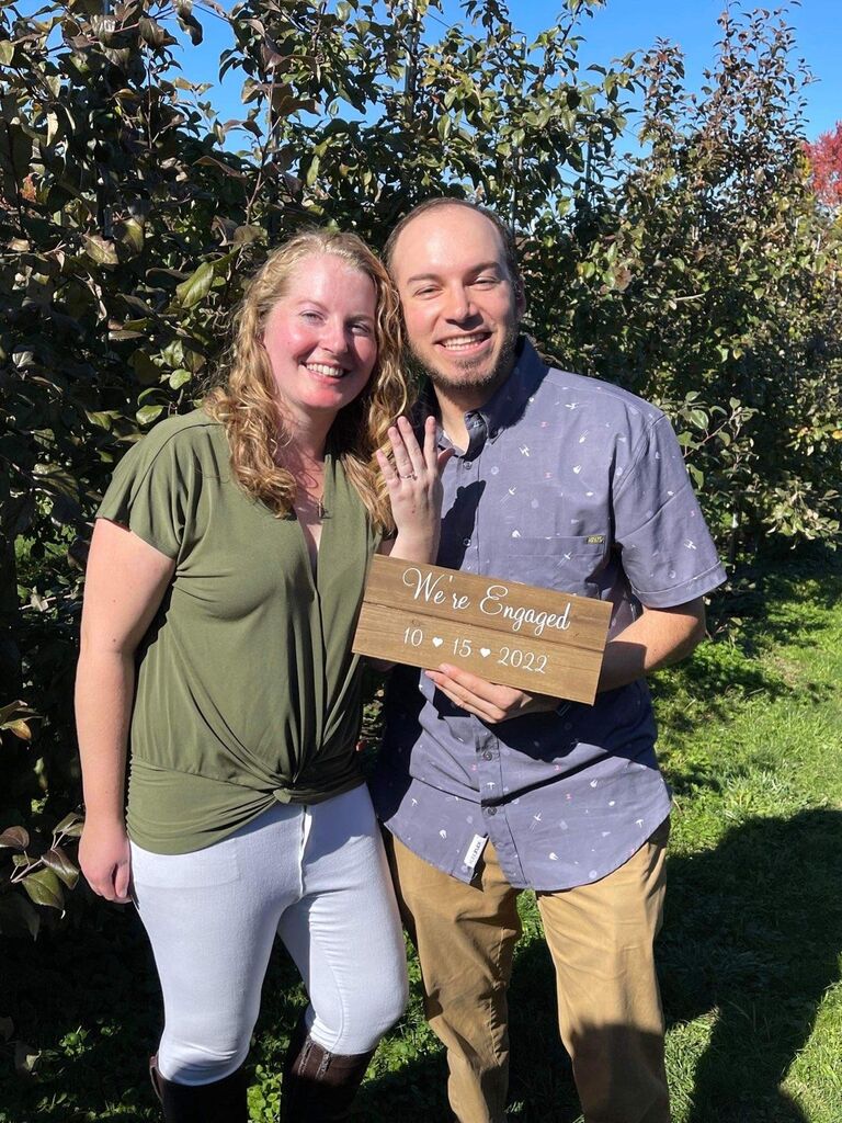 After almost 6 years of dating, we FINALLY got engaged while apple picking with our friends!