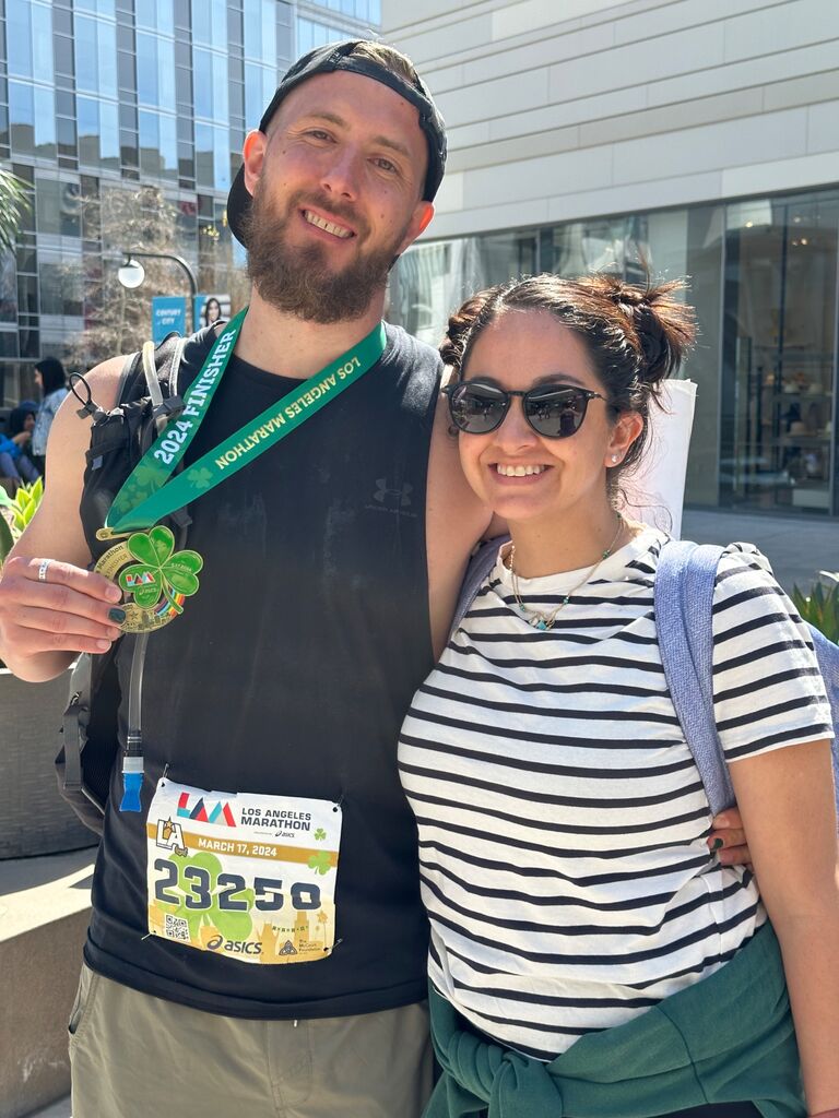 Kathy decided to support Derek on his 3rd and final LA Marathon on St. Patricks Day. He loves her so much he ran back several blocks just to give her a kiss, adding 15 minutes to his final time. 
