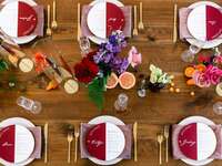 Wood farm table with purple place settings