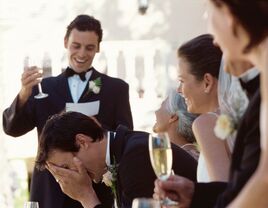 Best man giving embarrassing speech at wedding reception