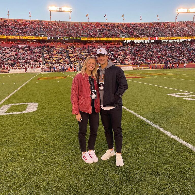 NFL Star Brock Burdy and Fiancée Jenna Brandt on the football field