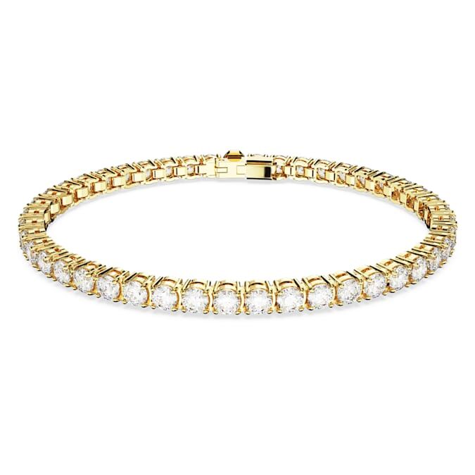 Gold bracelet with diamond studs