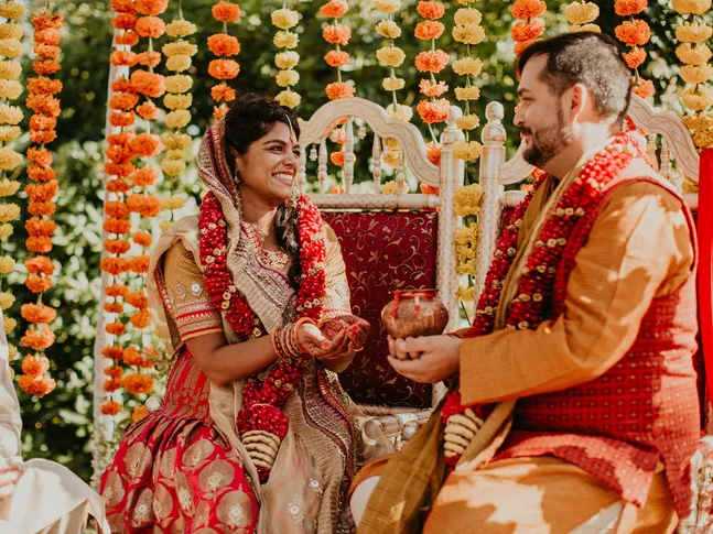 Hindu wedding ceremony decorated with marigold garlands 