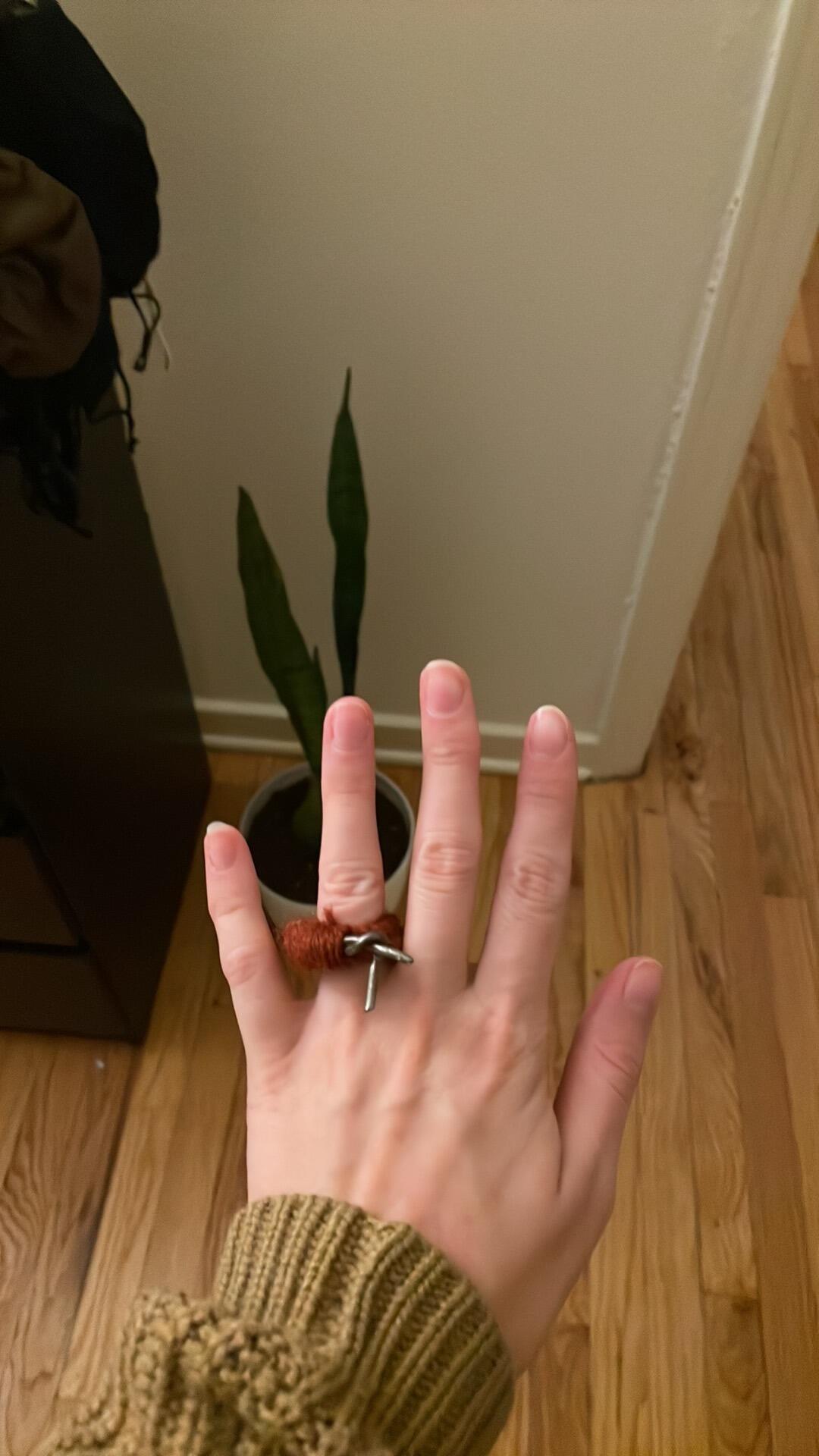 ...at the same time, Brian decided to propose, using the ring that his dad proposed to his mom with, made out of a coat hanger and some yarn...