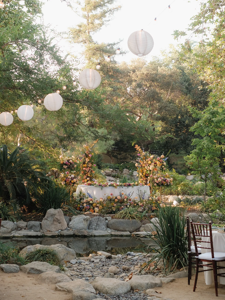 Hanging lanterns at nature-themed wedding