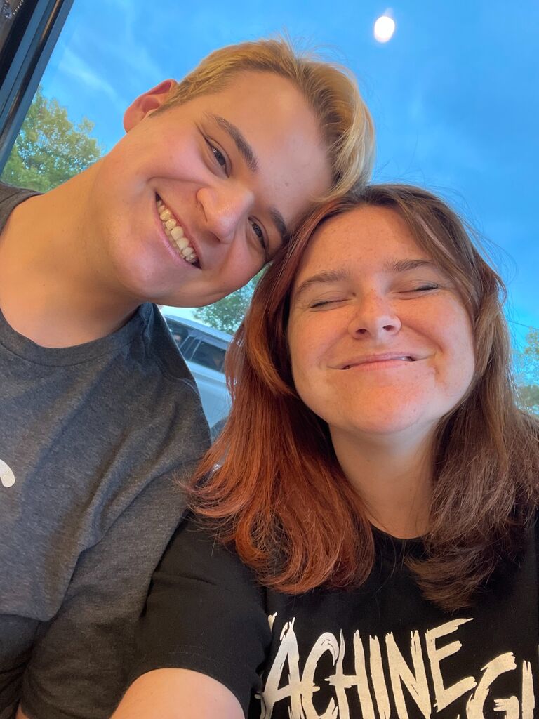 Their first date selfie, Brandon took them to chick fil a and then showed Madi around the fire department.