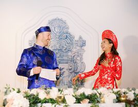 Groom giving speech during wedding reception.