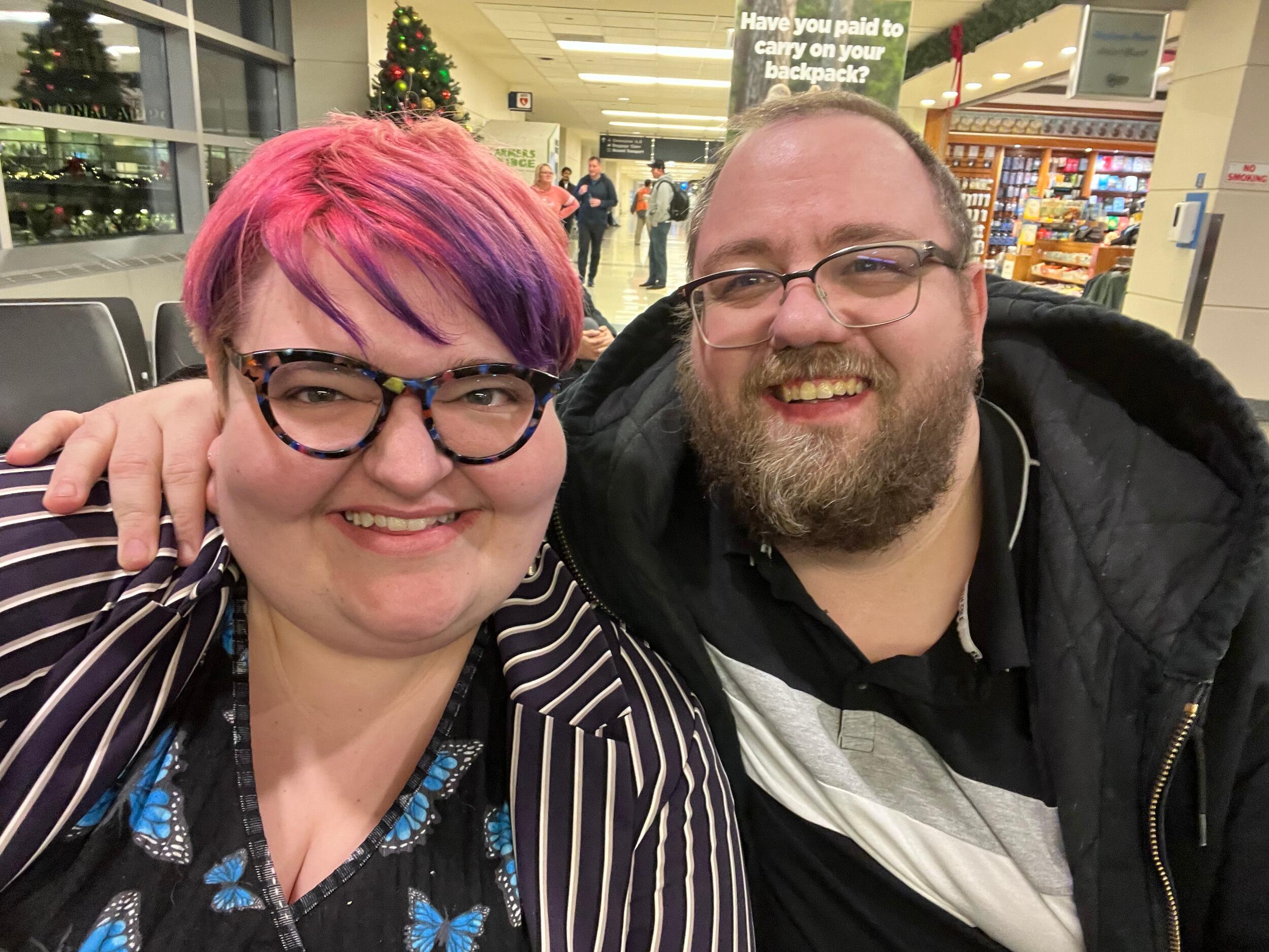 2 years together! This is us waiting at Midway Airport to board our flight to Las Vegas! (Melody's first time!)