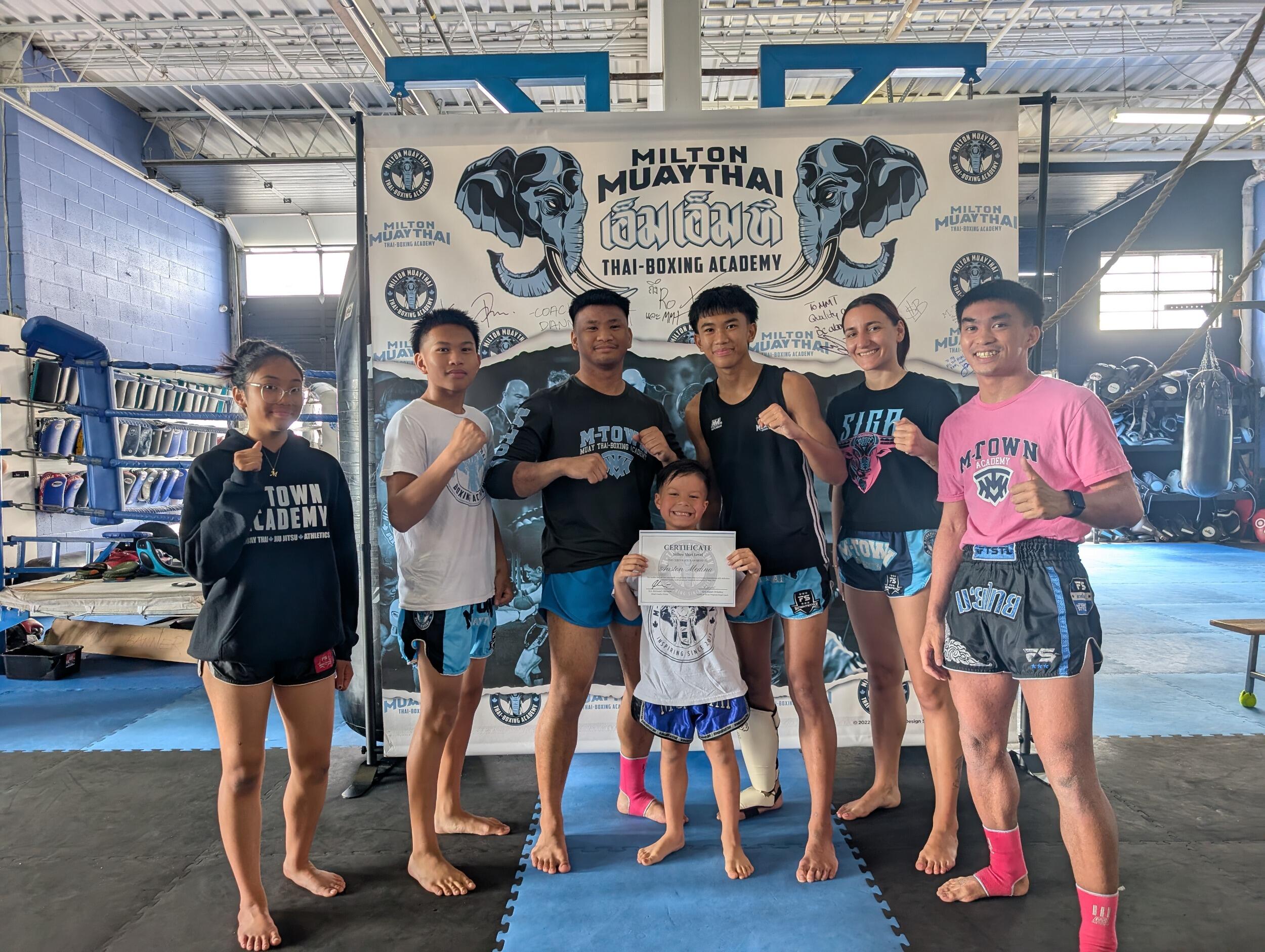 Auston conqours his Muay Thai yellow shirt level testing - Started Muay Thai in December and was invited to test two levels above!!! Proud parents here!