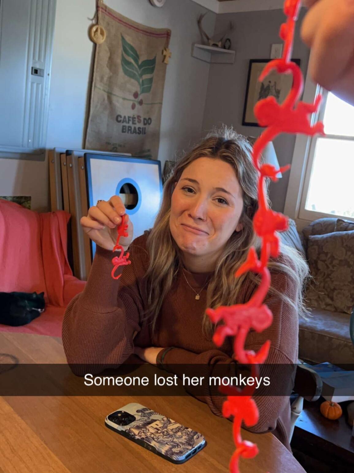 Emma lost an intense game of Barrel of Monkeys.