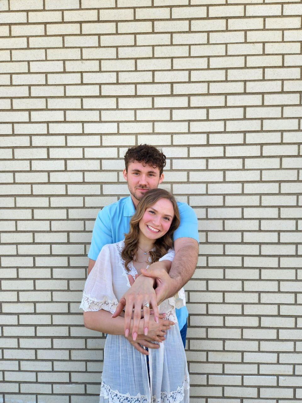 An engagement photo to share with family and friends after a week of engaged bliss