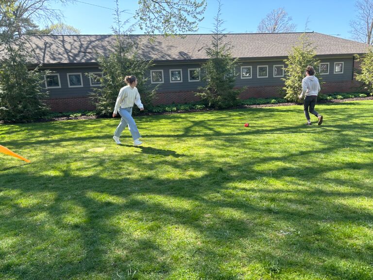 Early on in our relationship Drew would come to play with the kids that I watched.  One of them was "taking care" of my phone and snagged this shot of us playing baseball. 