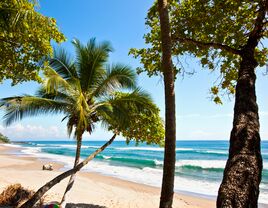 A sunny beach view of the Nicoya Peninsula in Tambor, Costa Rica
