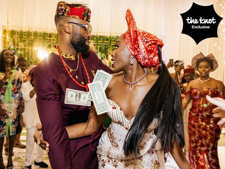 Chiney and husband Raphael doing the money dance at their wedding reception