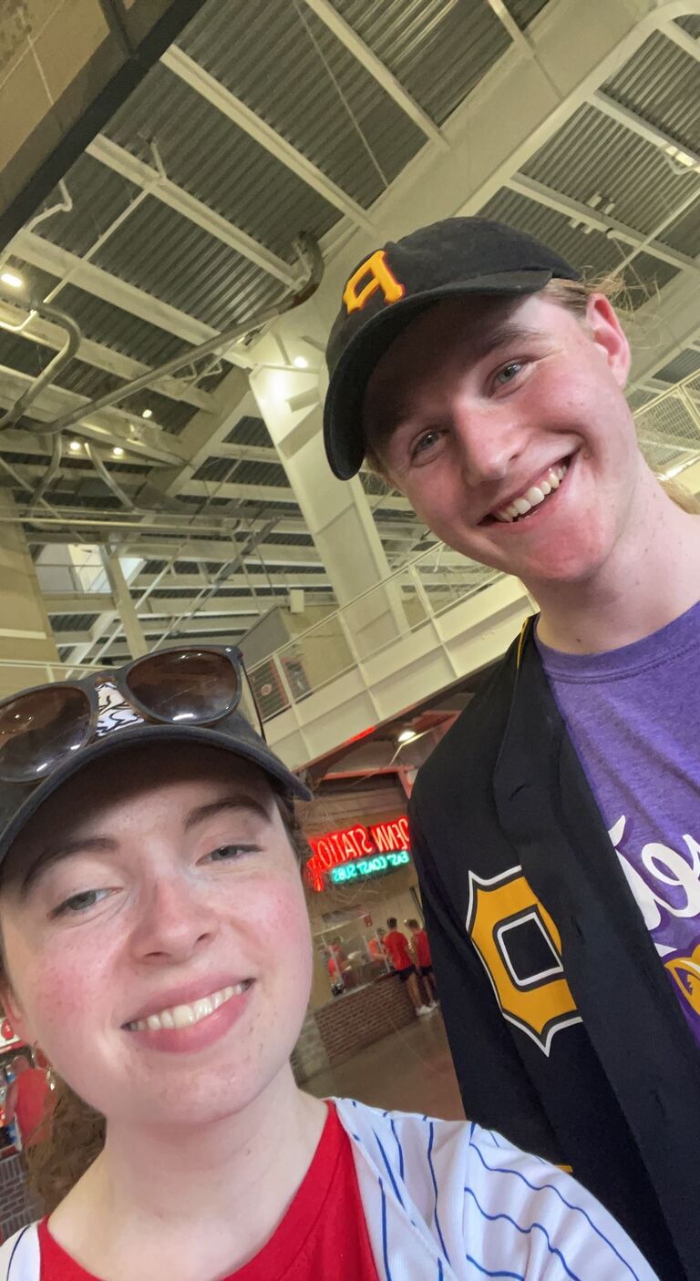 After talking for the first part of the summer after they met, Mikala and Wesley decided to each drive four hours to Cincinnati to watch a baseball game, as friends. Mikala didn't know it, but Wesley had been planning and nervous for weeks to ask Mikala out here. She said yes!