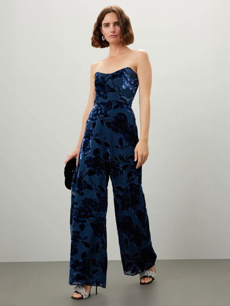 Strapless navy velvet jumpsuit for black-tie wedding