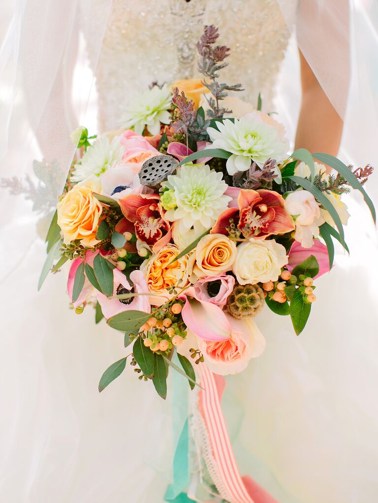 Modern bridal bouquet with succulents and seed pods
