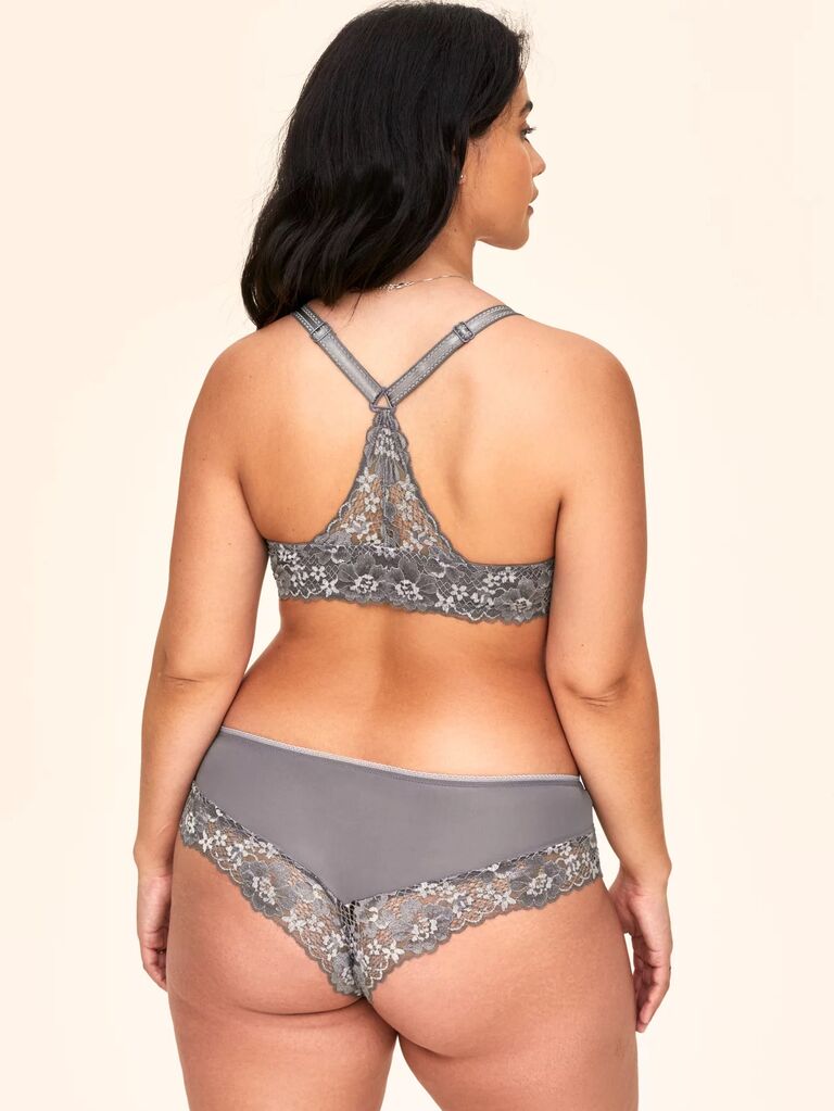 Model wears a gray lace underwear set. 