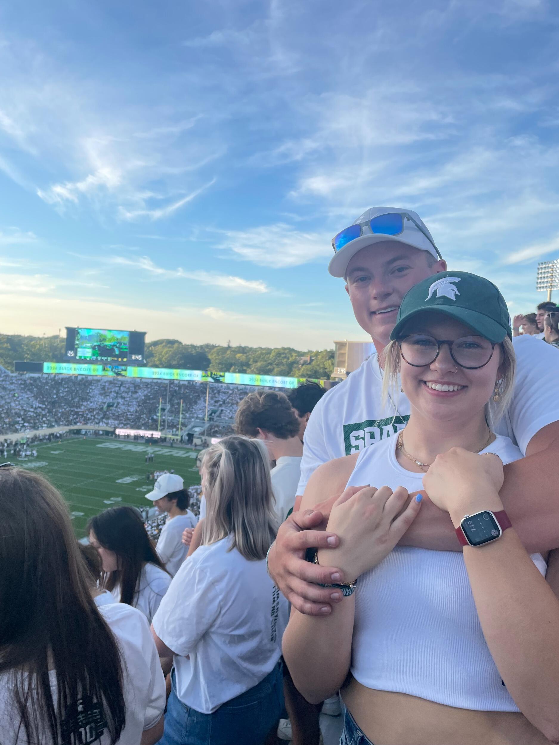 Alaina entered her sophomore year, and Caleb came to visit for the first football game! Go Green!
