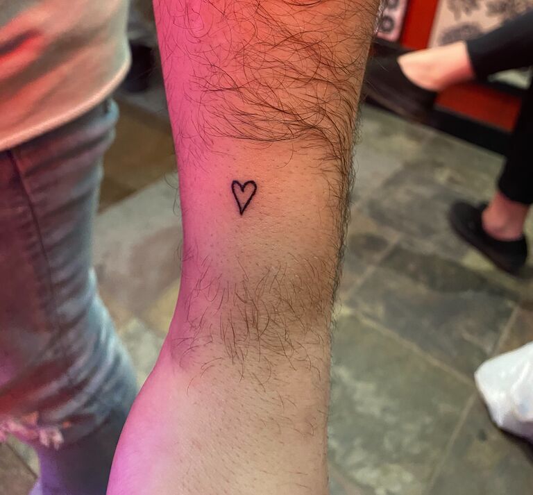 Celebrating Sarah's 23rd birthday by getting tattoos of hearts in each other's handwriting.