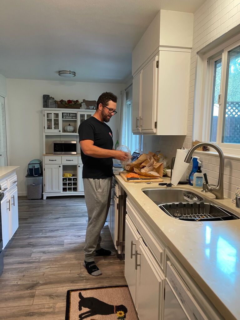 The day we finally met in person! Alli was recovering from surgery, so our first date was at Alli's house. As Andrew made a seafood chowder from scratch, Alli snuck this picture of Andrew to send to her friends. She was so excited he was finally home from Colorado.  