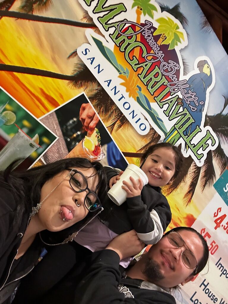 Another road trip-  they felt fortunate to be able to give their daughter these experiences. Here they are at Margaritaville.
