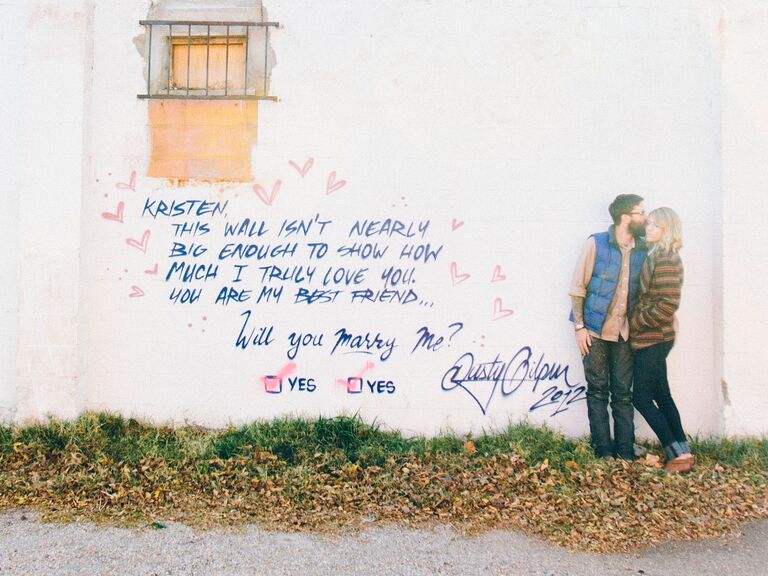 Graffiti outdoor marriage proposal