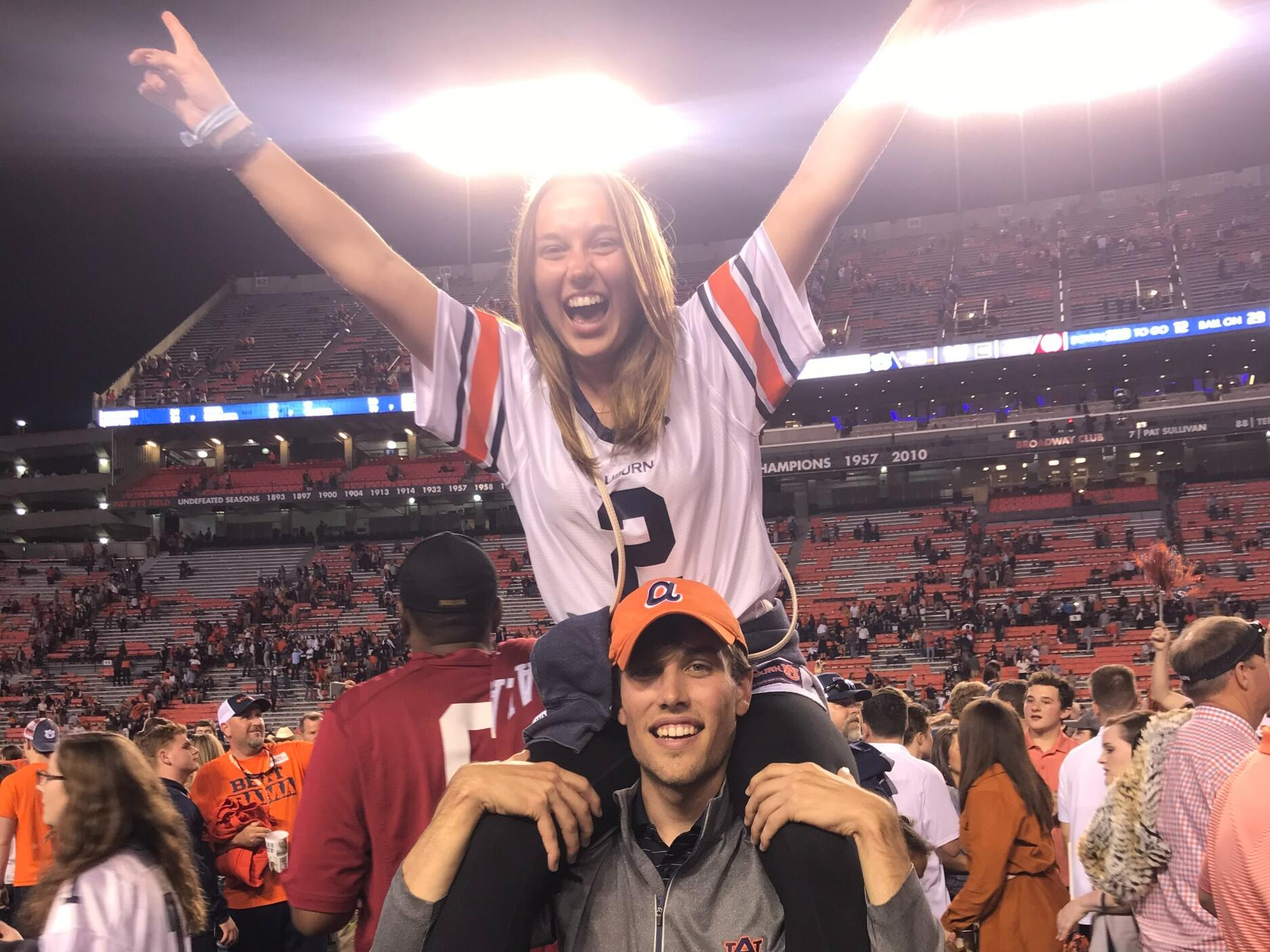 Celebrating on the field after Auburn beat Alabama in the Iron Bowl