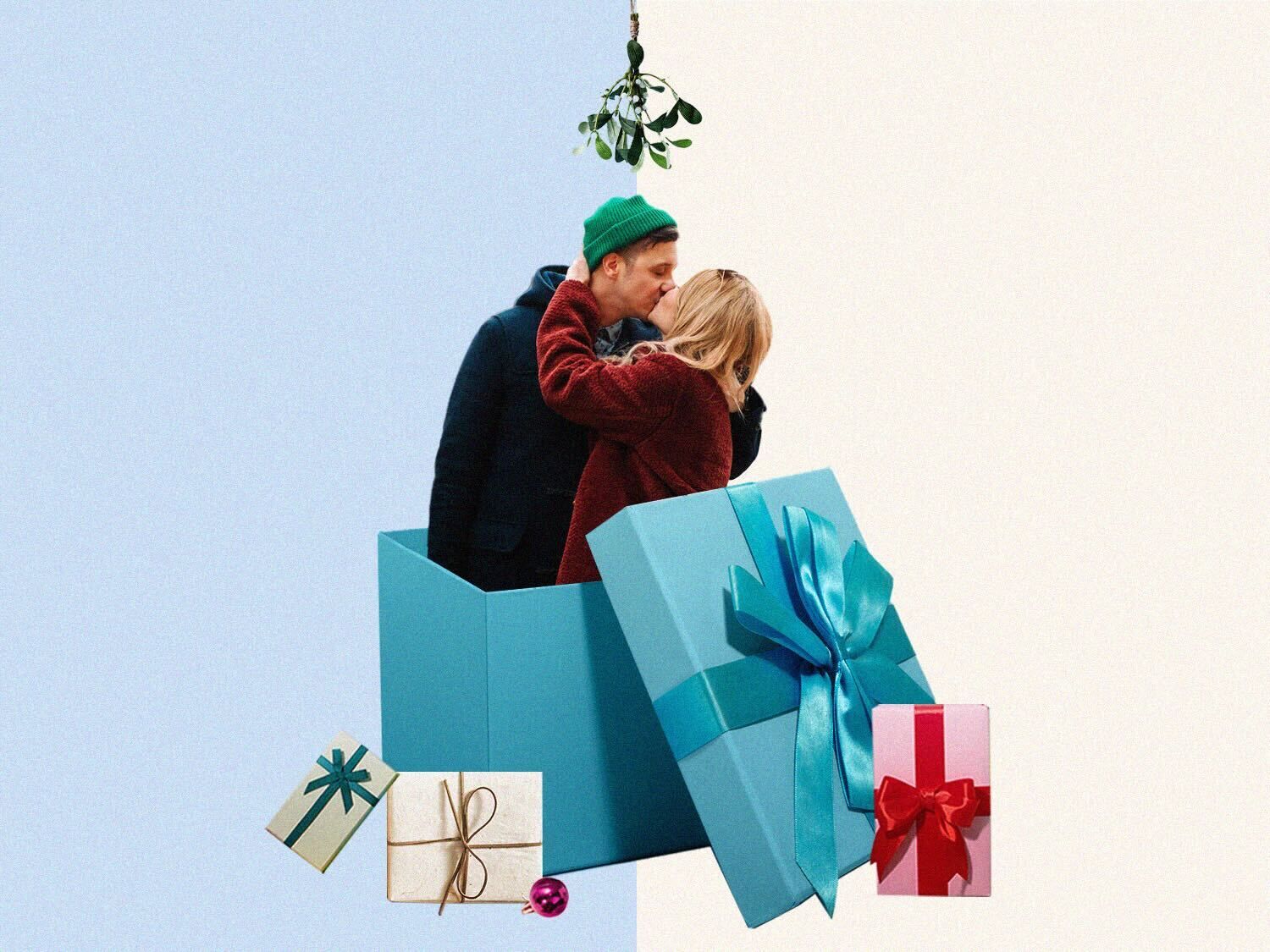 Couple kissing inside Christmas present box