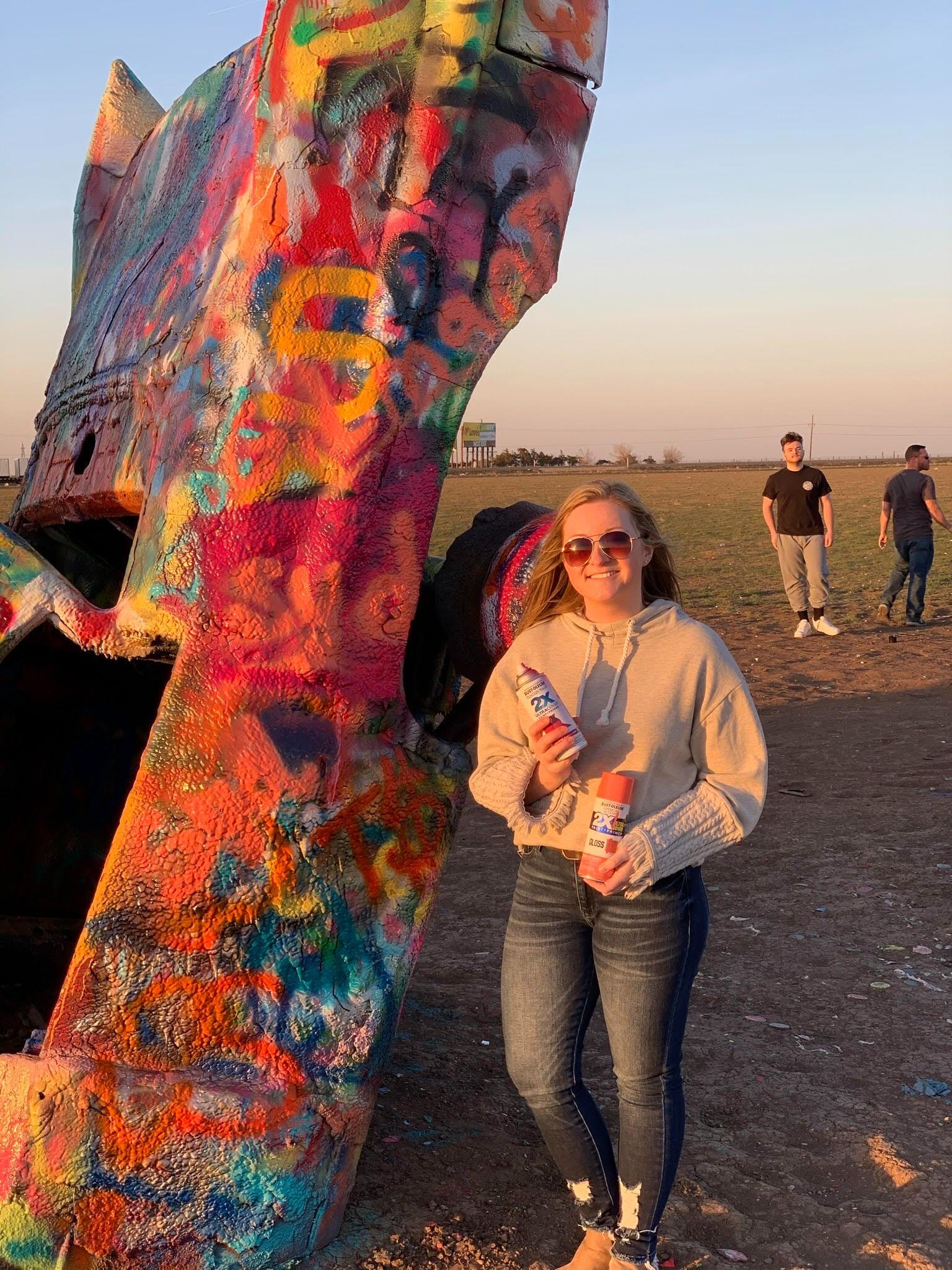 Sydney's job requires her to travel throughout Texas, Mississippi, Oklahoma, and Louisiana. Irronically, one of the dealers that she supports was located in the town where Cole lived. While in the area, Cole asked Sydney on a date. They spray painted cars at Cadalliac Ranch in Amarillo, Texas. Then they ate at Saltgrass Steakhouse and Cole discovered that one of Sydney's least favorite foods is steak. And to round out the date, Cole taught Sydney to drive a stick shift in the mall parking lot. 