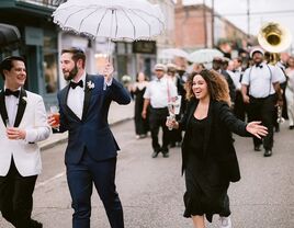 A wedding content creator capturing iPhone content at a wedding