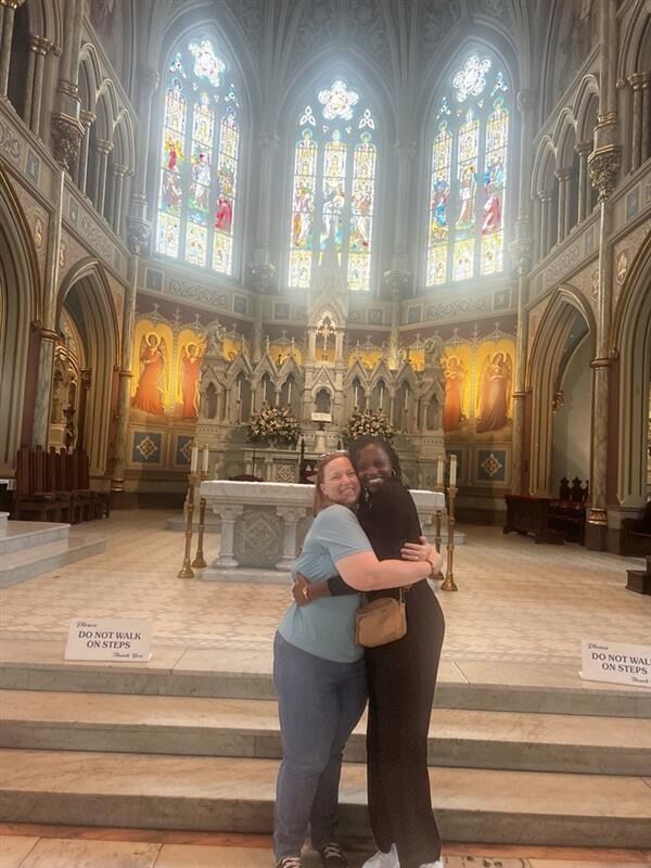 June meets Anne Clark by chance at the Savannah Cathedral