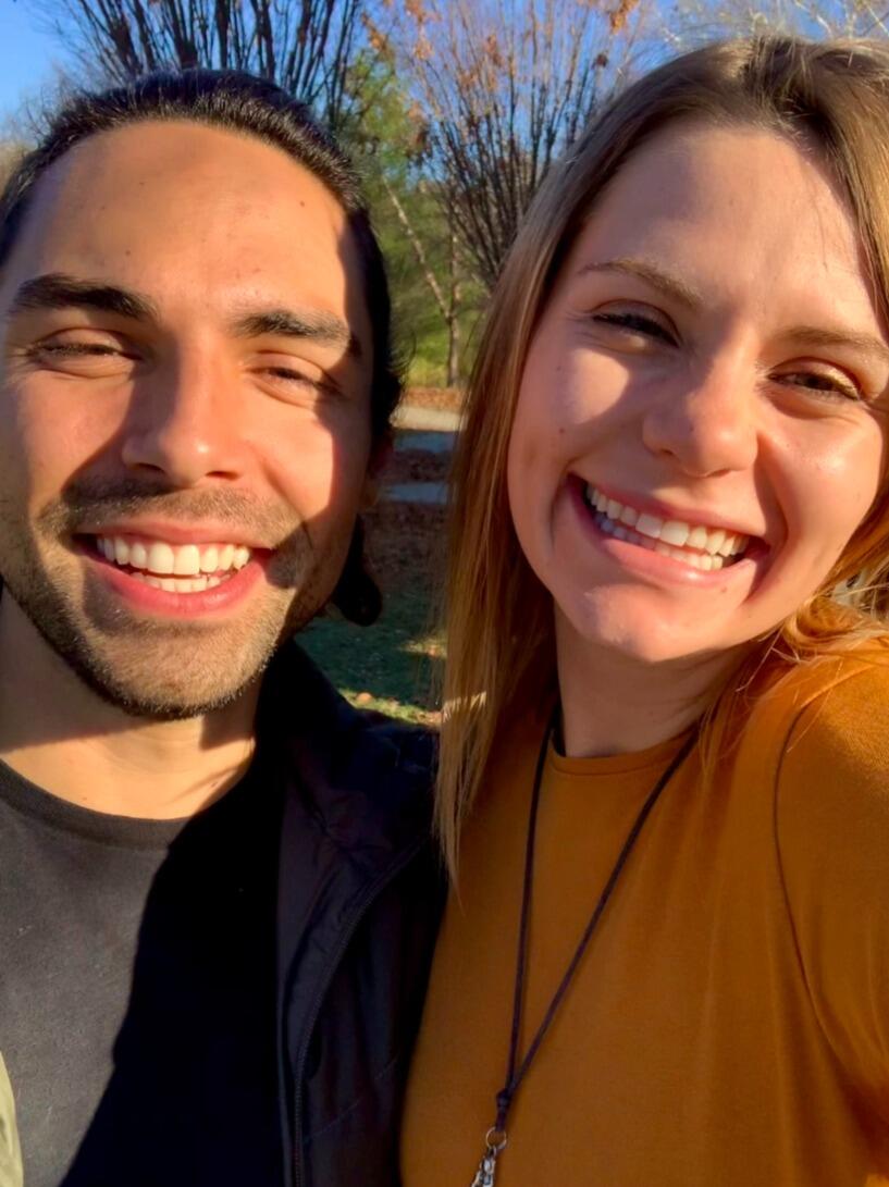 Caleb drove all day from Michigan to surprise Christina when she got off a flight at the KC airport. He asked her to be his girlfriend 2 days later.