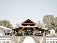 View of charming barn wedding venue at Harpor's Vineyard